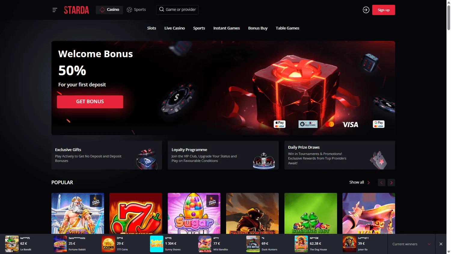 Starda Casino desktop home with the $600 welcome bonus and free spins offer